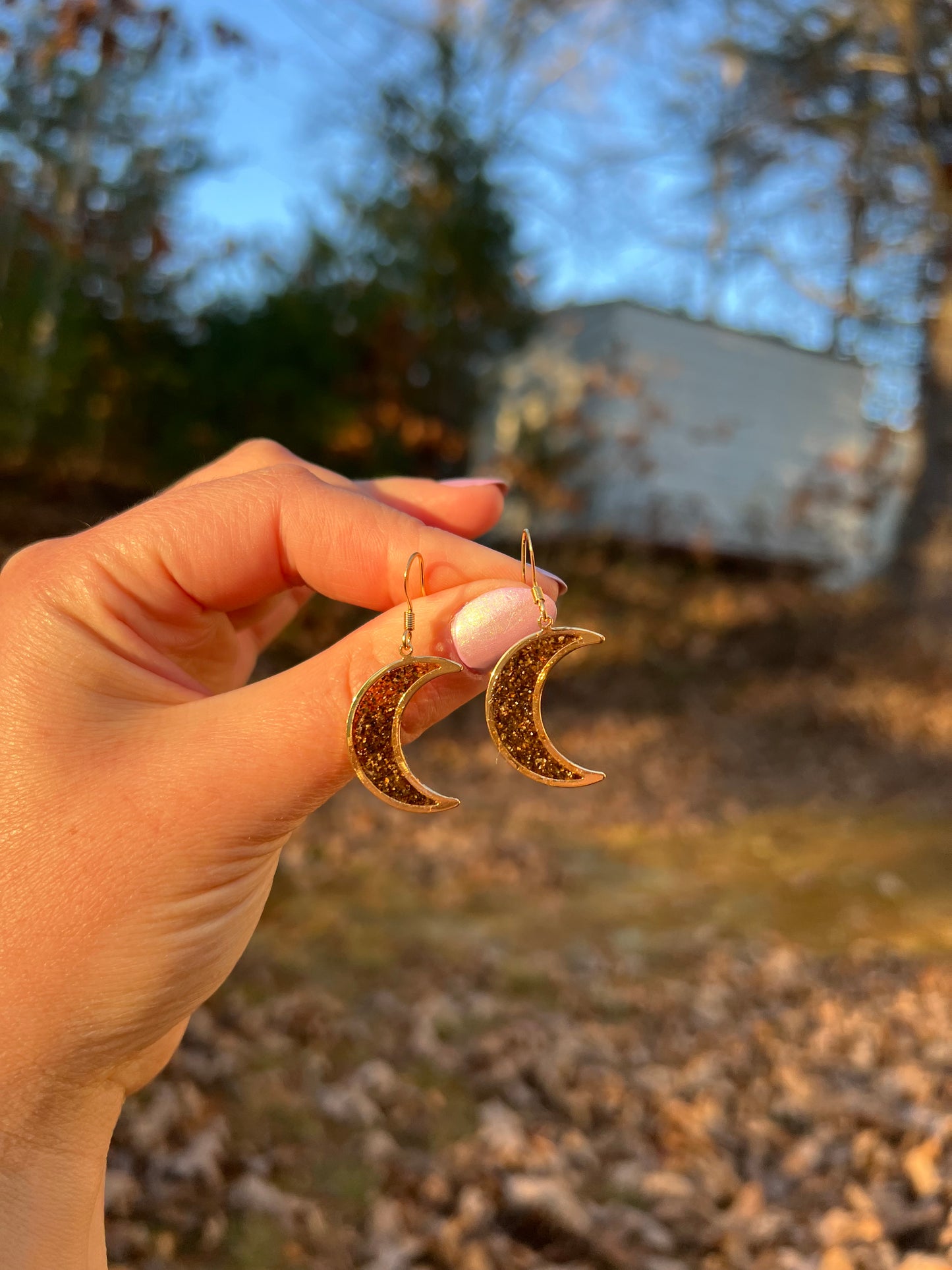brown and gold gemstone natural earrings in gold moon shape bezel