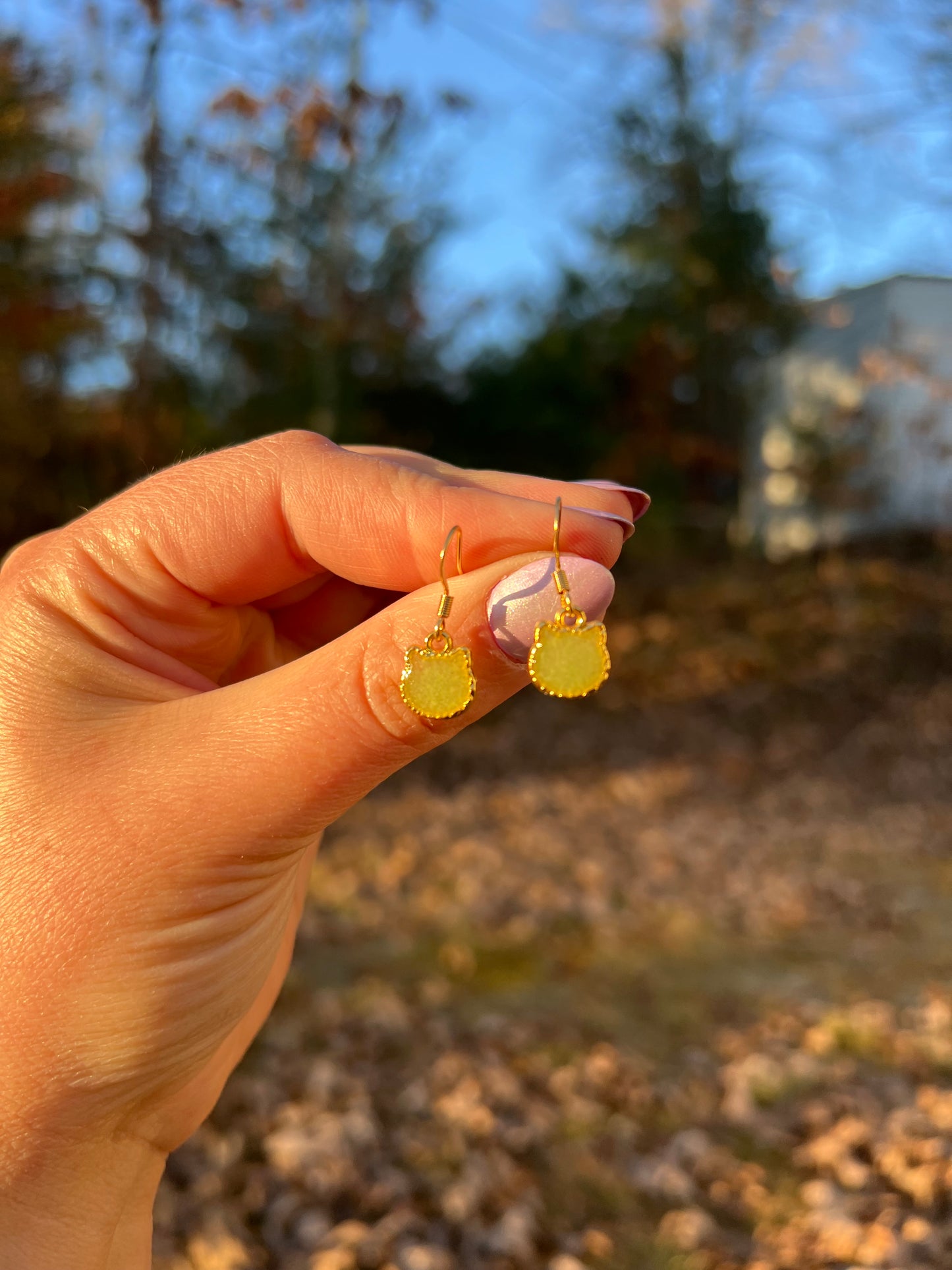 petite lime green cat dangle earrings